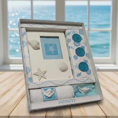 set regalo portafoto grande resina avorio, con salvietta, angioletto in gesso e tris candele glitter azzurre